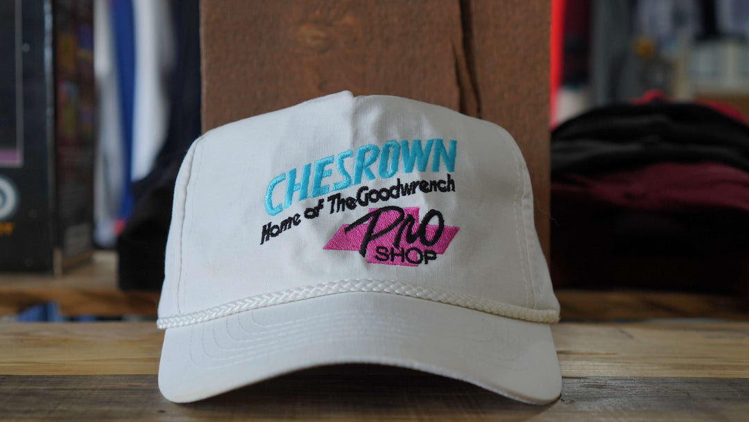 90s Chesrown Goodwrench Pro Shop white trucker hat, featuring vibrant branding, from West Block Vintage, ideal for fans of retro automotive and country trucker styles.
