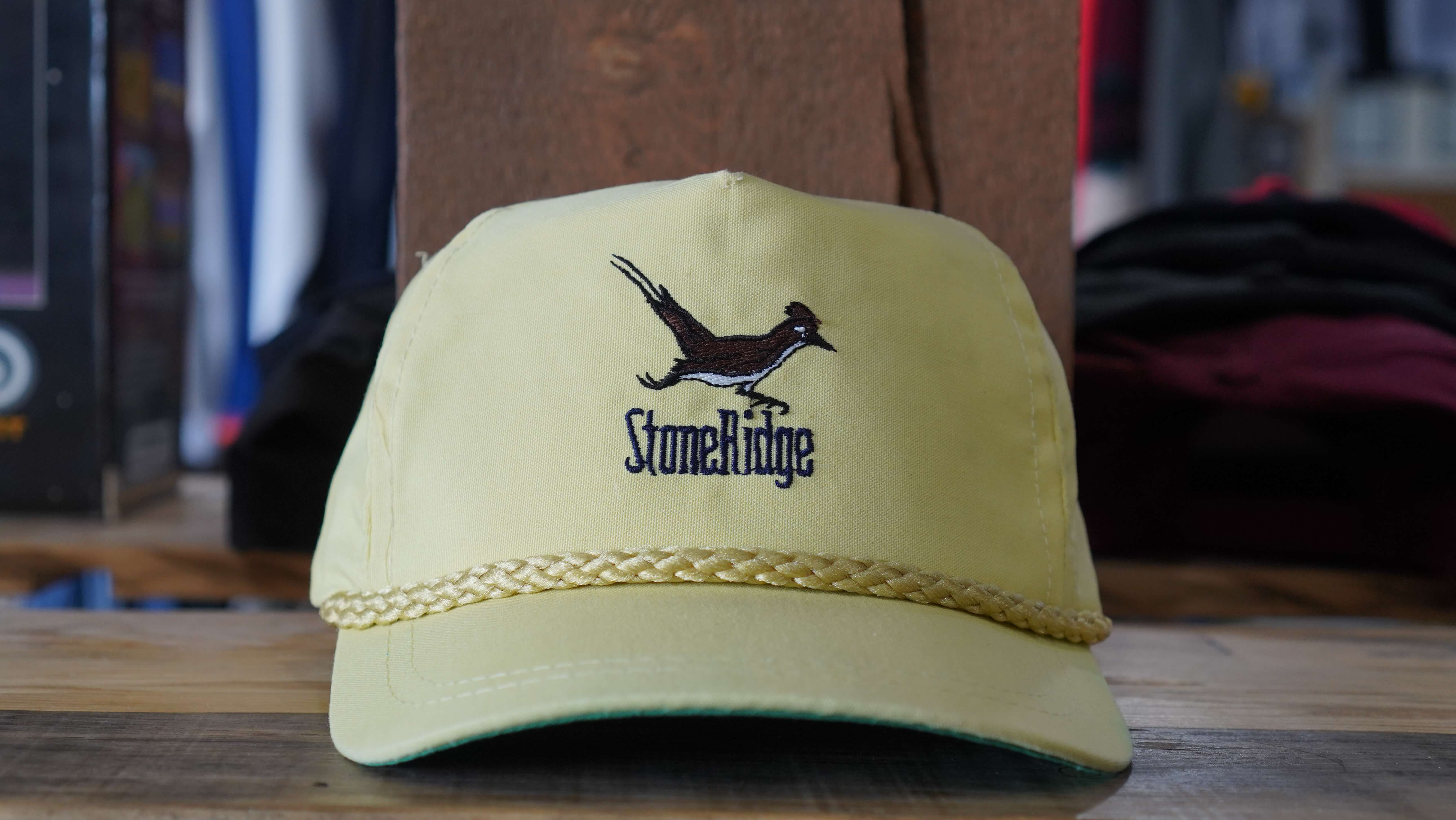 Vintage Stonehinge yellow rope hat with bird embroidery from the 90s, available from West Block Vintage—ideal for lovers of unique wildlife and country trucker hats.